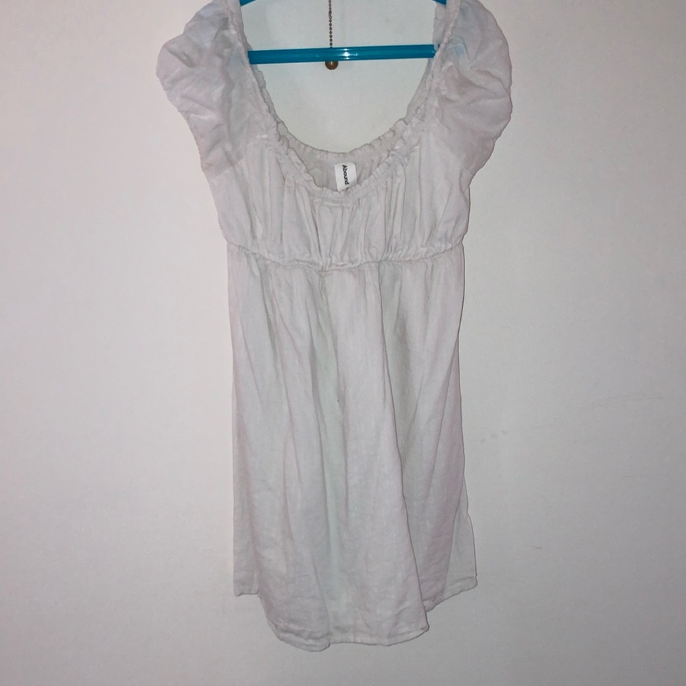 White Flowy Mini Dress with Ruffled Smocked Details